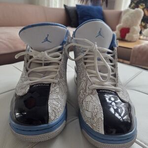 Air Jordan Sneakers with Blue and Black Accents